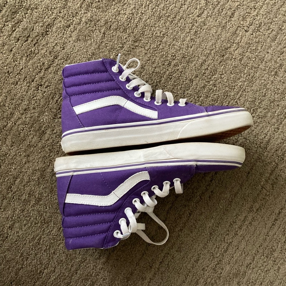 Purple and white high top vans